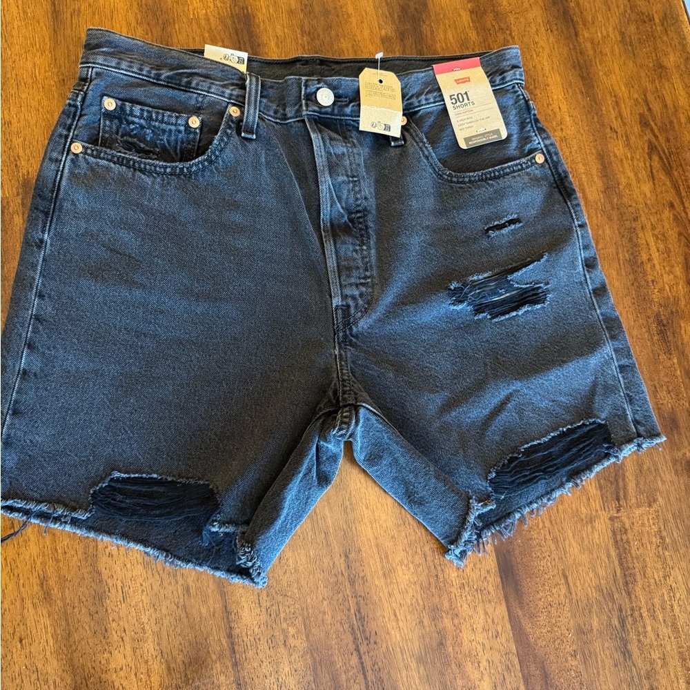 Brand New Black Distressed Women’s Levi’s 501 shorts. Tags attached.  Size 33
